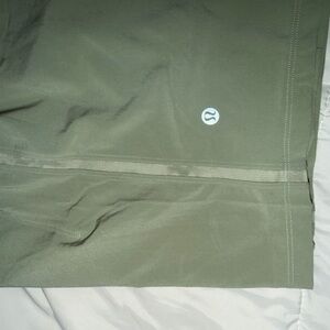 Sage green Lululemon Pacebreakers (7” inseam)